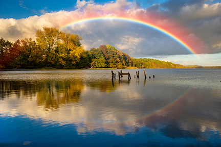 Rainbow over calm waters