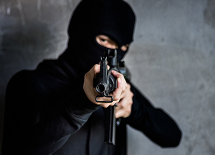 young gunman killer aiming his M16 gun