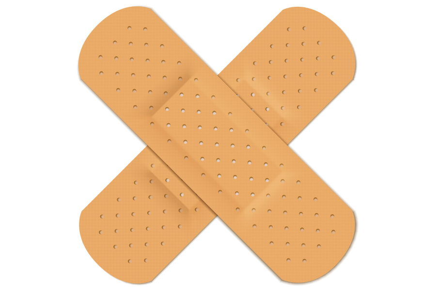 two bandaids in a criss cross