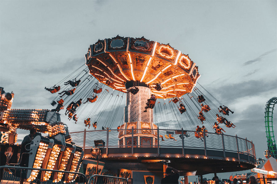 picture of a carnival swing ride spinning around