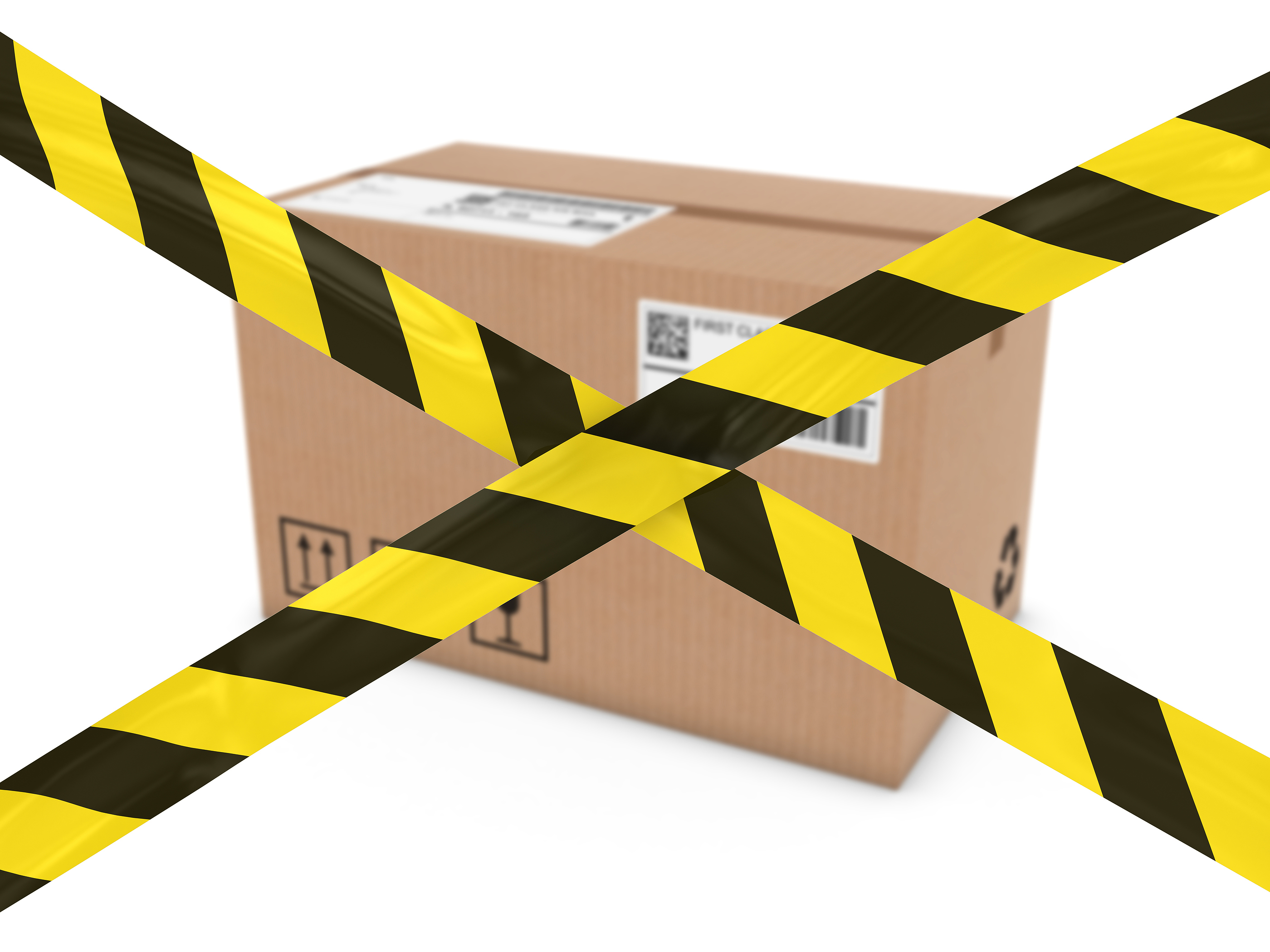 Cardboard Box behind Striped Hazard Tape