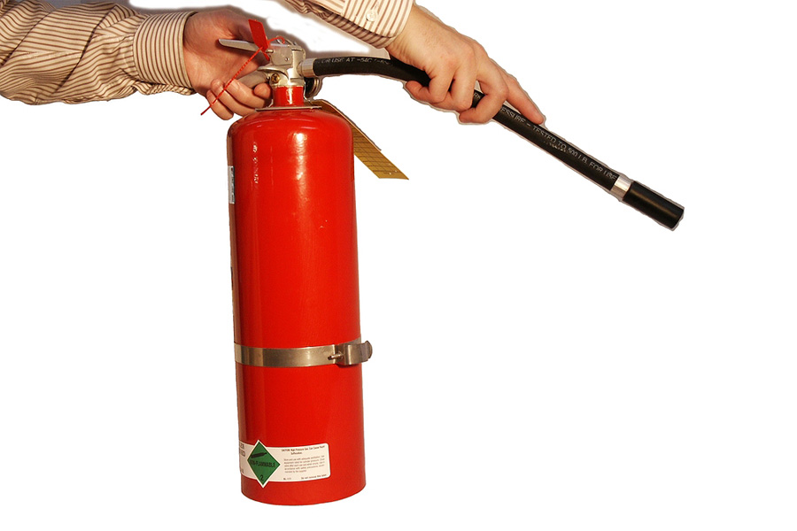 Man holding a fire extinguisher