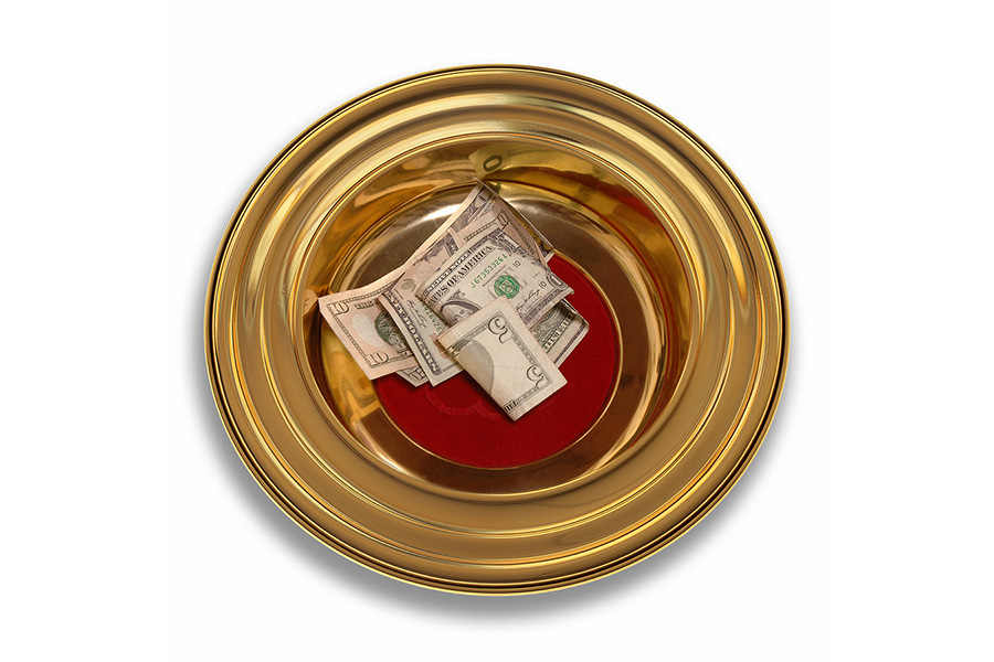 church offering plate with money on it